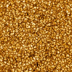 Immagine ravvicinata della superficie solare che mostra i dettagli del plasma ribollente e granulare